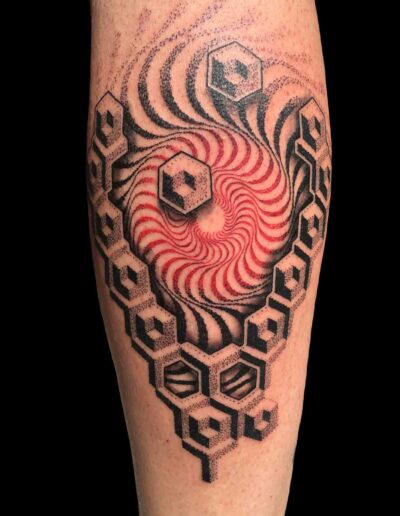 Tatuaggio-mandala-geometrico-polpaccio-uomo